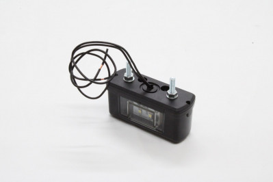 0023717 Фонарь подсветки номерного знака