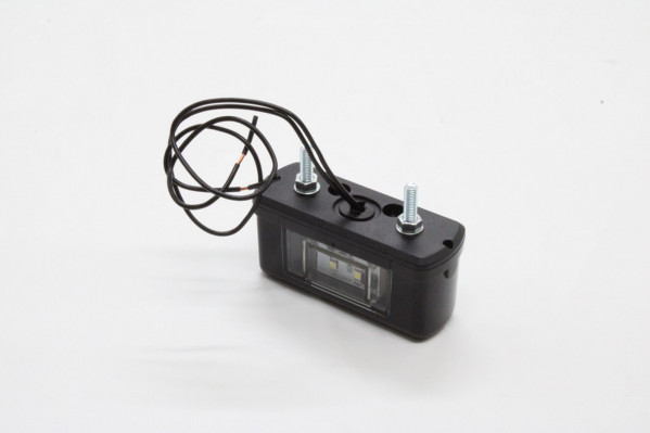 0023717 Фонарь подсветки номерного знака — 1